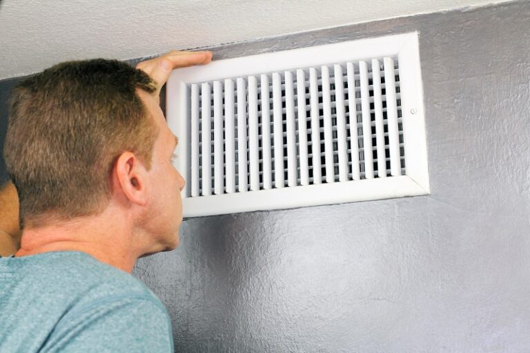 Heat Pump vent blowing warm air